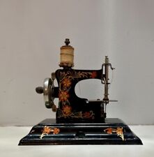 Antigua máquina de coser alemana Casige juguete manivela infantil negro/floral años 30’s segunda mano  Embacar hacia Argentina