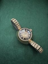 Usado, Relógio mecânico feminino Timex década de 1970 corda manual tom bronze pulseira elástica USO comprar usado  Enviando para Brazil