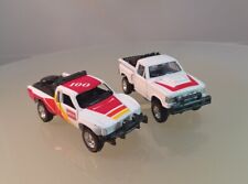 Par de camionetas pickup Maisto (Toyota SR5 ""Hickey"" y Ford F-150, blancas - escala 1/64 segunda mano  Embacar hacia Argentina