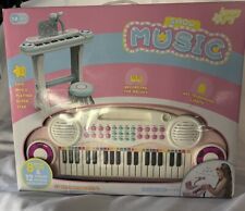 Juego de luz electrónica de órgano para teclado de piano de 37 teclas para niños con taburete y micrófono, usado segunda mano  Embacar hacia Argentina