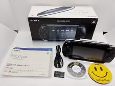 Sistema piano negro Sony PSP 2000 con cargador de caja [sin región] Playstation con caja segunda mano  Embacar hacia Argentina