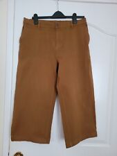 Muji rust trousers for sale  CAERNARFON