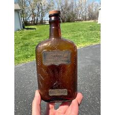 c1910s E.J. Botella de whisky Curley "Antigua" Spiritus Frumenti ámbar en relieve Spi segunda mano  Embacar hacia Argentina
