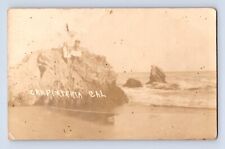 Foto antigua de niñas posando en roca de playa CARPINTERIA California RPPC 1916 segunda mano  Embacar hacia Argentina