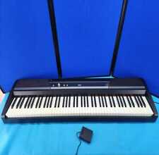 Piano/teclado digital Korg SP170S con fuente de alimentación y pedal de soporte probado, usado segunda mano  Embacar hacia Argentina