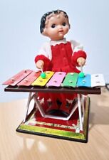 Bambola suonatrice xilofono usato  Roma