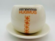 Caneca e pires Max Brenner Hug, Hot ‘Chocolate by the Bald Man’, branco e laranja comprar usado  Enviando para Brazil