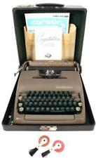 Máquina de escribir vintage Smith-Corona Clipper bronceada y verde con estuche y manual segunda mano  Embacar hacia Argentina