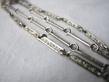 Collar de cadena de protección larga de colección en tono plateado grabado, usado segunda mano  Embacar hacia Argentina