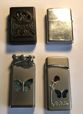 Four cigarette lighters for sale  Powell