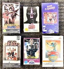 6 exhibidores vintage de tienda de video BETA de los años 80. Sin cintas. Camisetas PROM NIGHT, nerds segunda mano  Embacar hacia Argentina