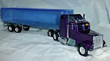 Camion Americano de fricción color violeta con remolque transparente. Esc: 1:43? segunda mano  Embacar hacia Argentina