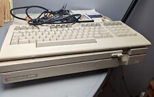 Computadora vintage Commodore 128d con teclado, cables y juegos, usado segunda mano  Embacar hacia Argentina