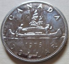 1976 - 1979 lote de cuatro monedas de dólar de níquel de Canadá.  Dólar canadiense de canoa $1 segunda mano  Embacar hacia Argentina