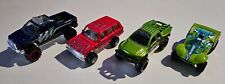 FOUR LOOSE HOT WHEELS TRUCKS. TUNDRA, RANGE ROVER, FORD RAPTOR and DA'KAR, used for sale  Shipping to South Africa
