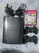 Sony PlayStation 3 Super Slim - 500 GB - Consola Negra con 2 Mandos y GTA V, usado segunda mano  Embacar hacia Argentina