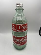 Usado, Botella de Coca-Cola de vidrio verde de 2 litros de colección década de 1970 67,6 oz Fl Con tapa segunda mano  Embacar hacia Argentina