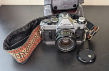 Cámara fotográfica vintage Canon AE-1 SLR 35 MM ~ plateada con lente de 28 mm segunda mano  Embacar hacia Argentina