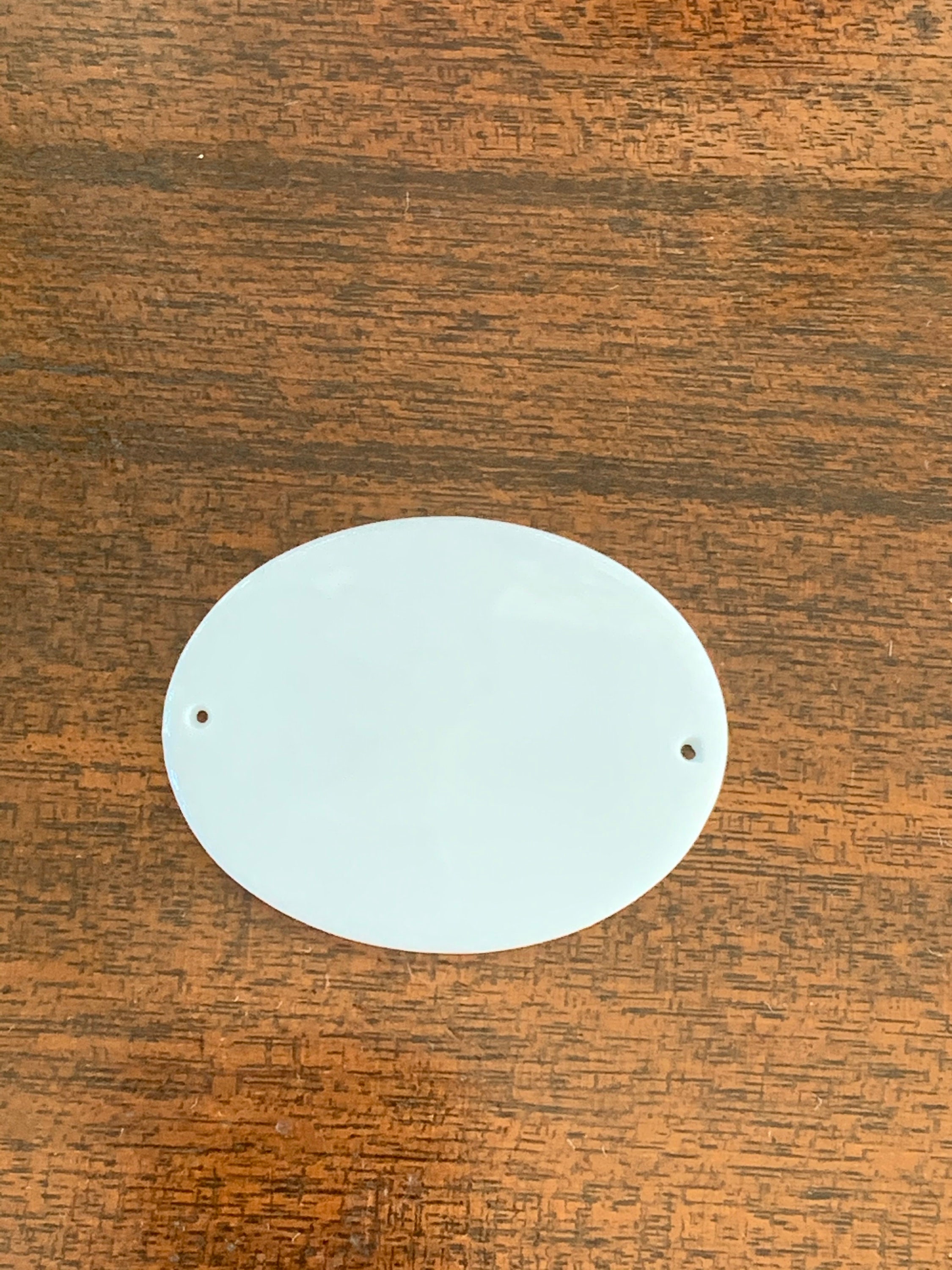 Oval porcelain disk for sale  