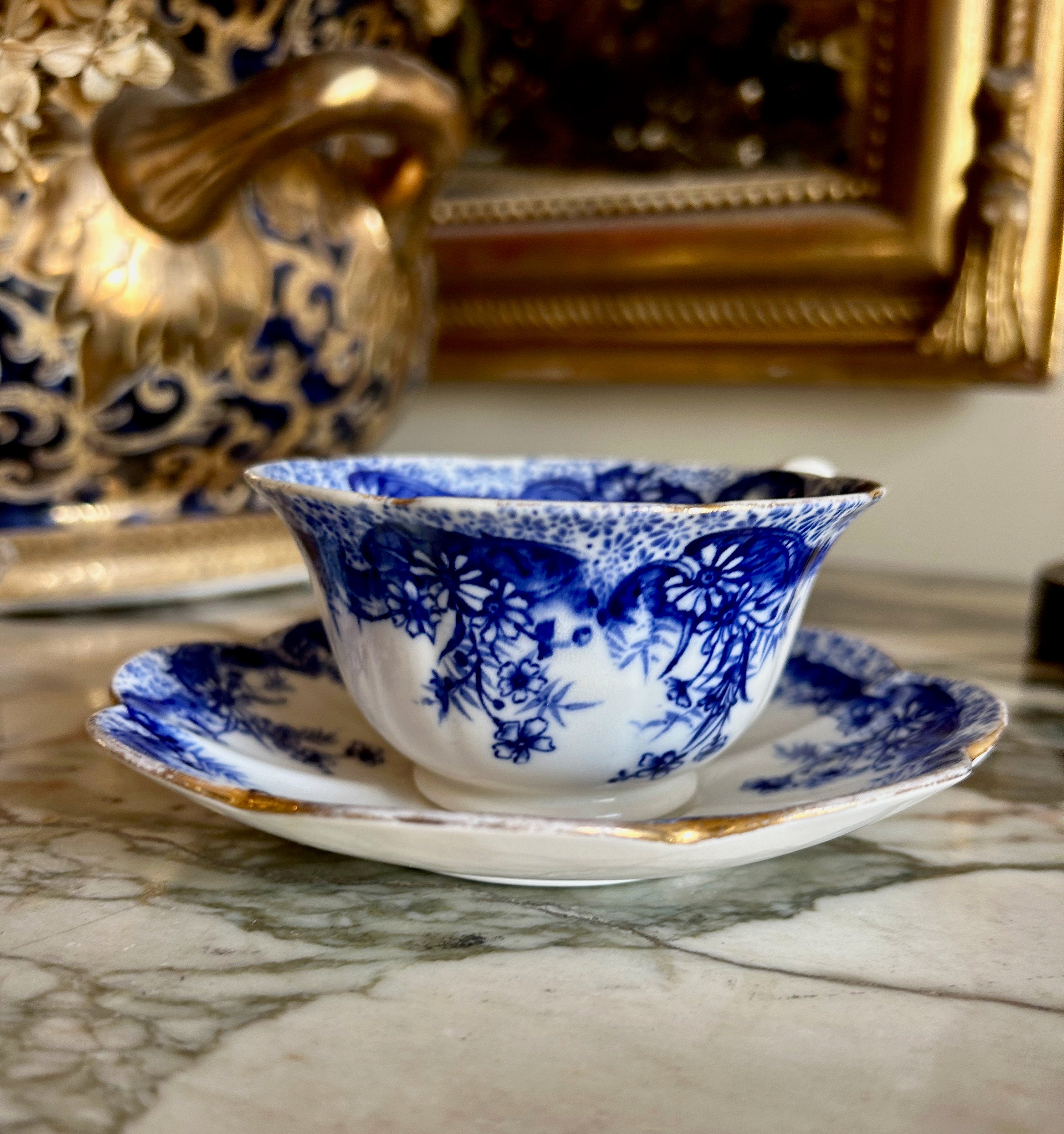 Flow blue cup for sale  