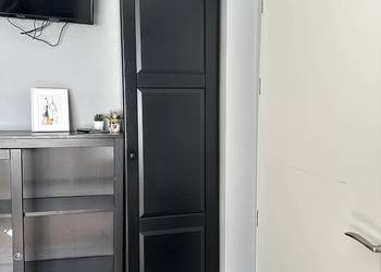 szafa PAX IKEA czarnobrązowa, z wyposażeniem, używany na sprzedaż  Chrzanów