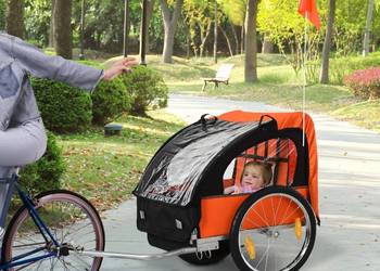 Przyczepka rowerowa z pasami dla 2 dzieci, używany na sprzedaż  Brzesko
