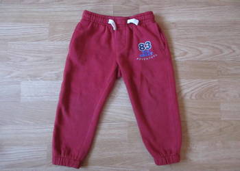Używany, Ciepłe spodnie dresowe 86/92 na sprzedaż  Słupca