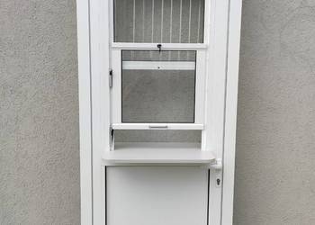 Drzwi aluminiowe z oknem podawczym i parapetem na sprzedaż  Świebodzin