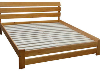 Drewniane łóżko FUTURA z wygietym wezgłowiem na sprzedaż  Prudnik