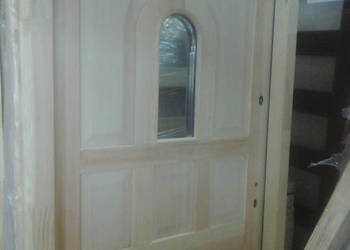 Używany, drzwi wejsciowe ocieplone drewniane sosnowe na sprzedaż  Rewal