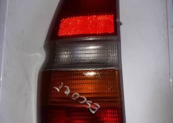 Lampa tył lewa Ford Escort MK7 kombi, używany na sprzedaż  Ostrów Wielkopolski