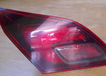 Lampa lewa tylna w klapie dymiona Opel Astra J na sprzedaż  Miechów-Charsznica