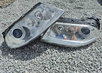 Lampy reflektory VW Passat B5 fl bi xenon Hella na sprzedaż  Kielcza