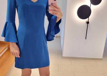 Niebieska sukienka dekolt w serek rękawy falbany AGGI na sprzedaż  Liszki