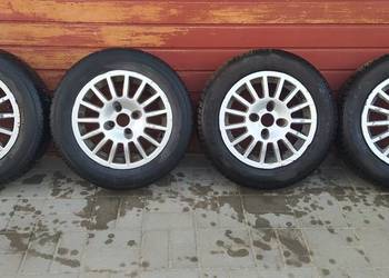 Używany, Koła aluminiowe z oponami 4x100 na sprzedaż  Kozienice