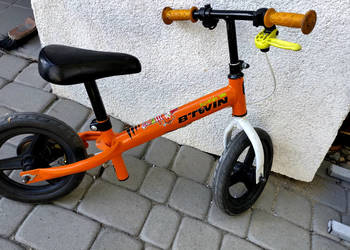 Rowerek biegowy runride pomaranczowy btwin decathlon na sprzedaż  Szewce